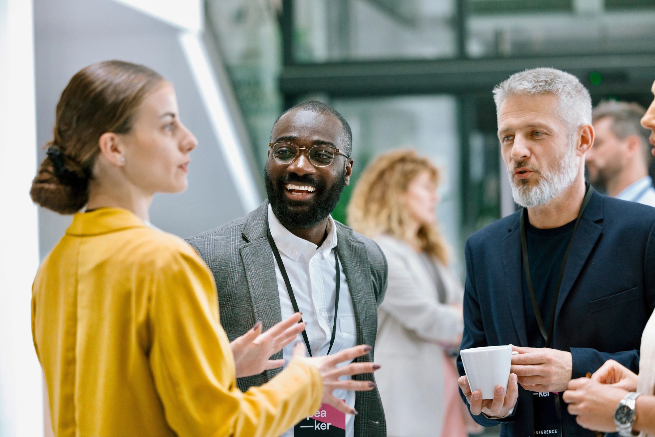 Leaders talking during a conference break