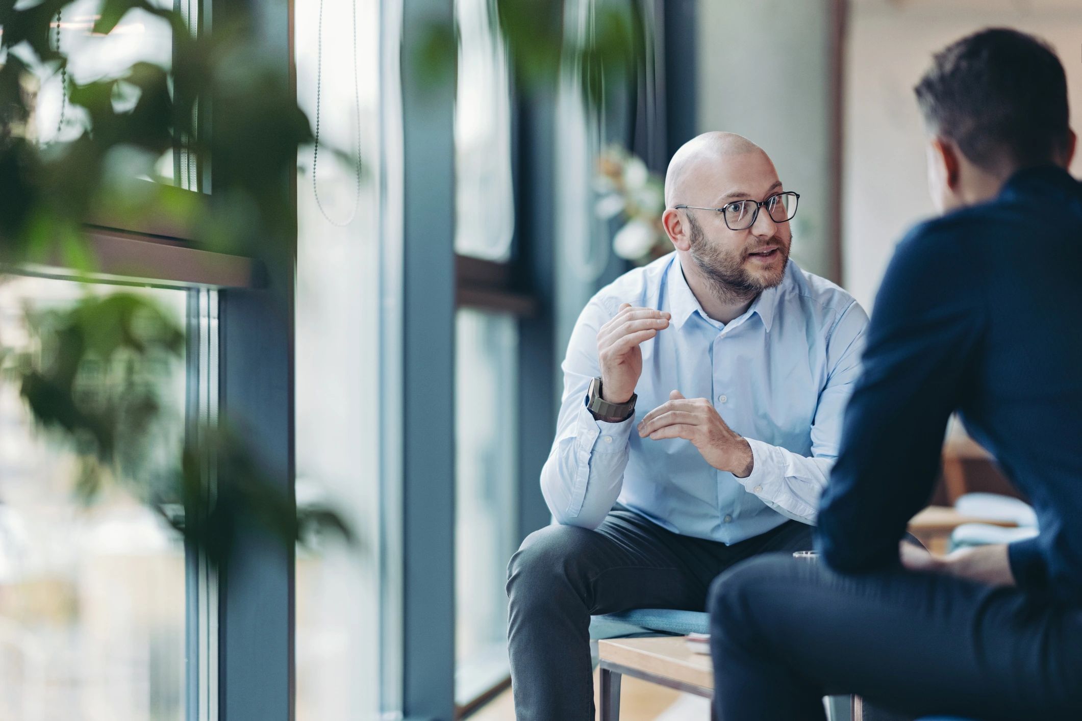 Mentor explaining a concept to a colleague
